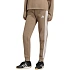 Spodnie damskie adidas Essentials 3-Stripes Fleece Slim beżowe KF8317 dámské