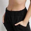 Dziewczęce juniorskie spodnie dresowe JOGGING D0C8P Black - DIM